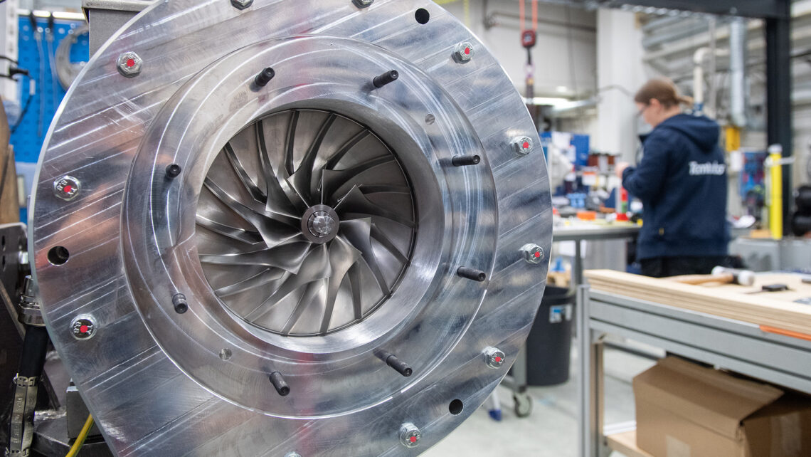 Air is compressed at the outer edge of the high-speed impeller